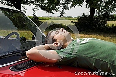 Resting on a car Stock Photo