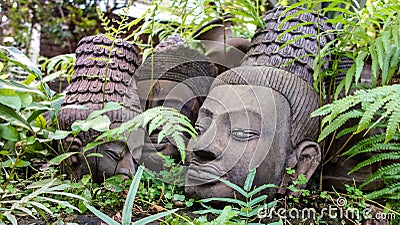 Resting Clay Sculpture Buddha Heads Stock Photo