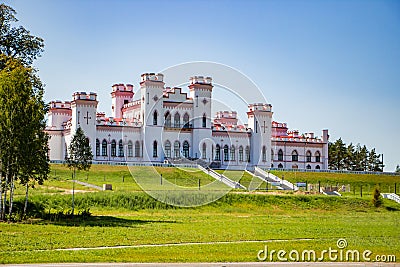 Restoration of an old medieval castle. Beautiful facade of the palace in Kossovo, Brest region, Belarus. Summer landscape Stock Photo