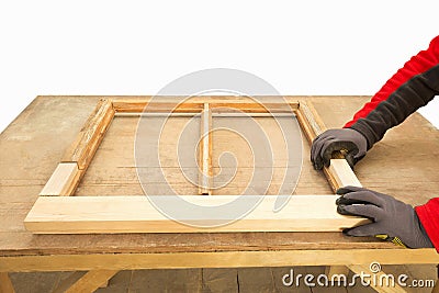 Close up of a carpenter repairing sash window frame Stock Photo