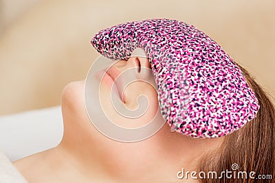 Restorative eye pillow covers eyes Stock Photo