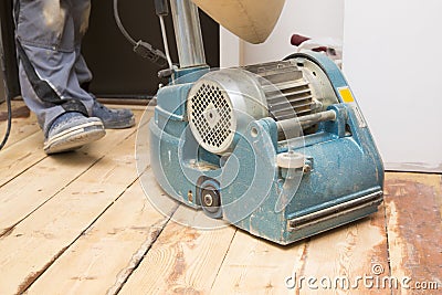 Restore plank floor with grinding machine Stock Photo