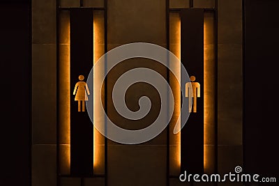 Restroom concept. Restroom sign on a toilet door. Female and male restroom sign. Restroom signs in public place Stock Photo