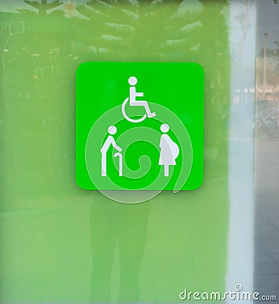 Restroom sign for disability Stock Photo