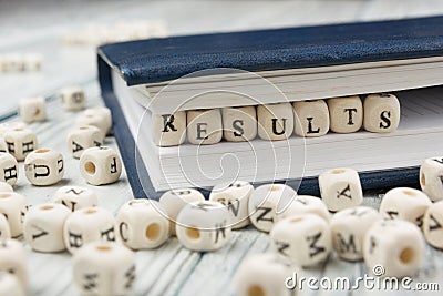 Result word background on wood blocks. Wooden ABC Stock Photo