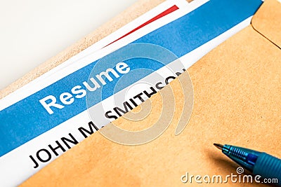 Resume letter background in brown envelop and pen Stock Photo