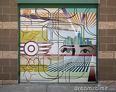 `Resurgence` by Paul Bagley, part of the Automobile Alleyâ€™s Door Tour beautification project Editorial Stock Photo