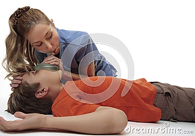 Resuscitating unconscious boy Stock Photo