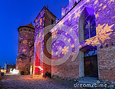 Reszel, Poland - January 30, 2024: Christmas illuminations at the Teutonic castle in Reszel in Warmia at dusk, Poland Editorial Stock Photo