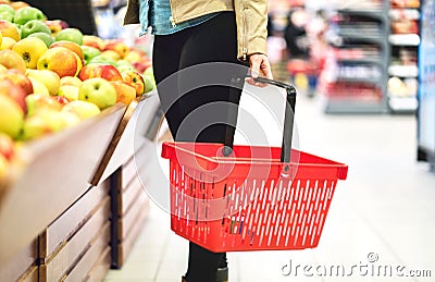 Retail, sale and consumerism concept. Customer in supermarket. Stock Photo