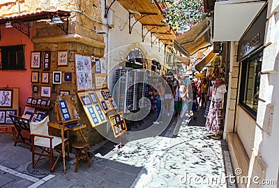 Rethymnon, Island Crete, Greece, - July 1, 2016: People and tourists walking on the narrow street of Rethymnon part of Old Town Editorial Stock Photo