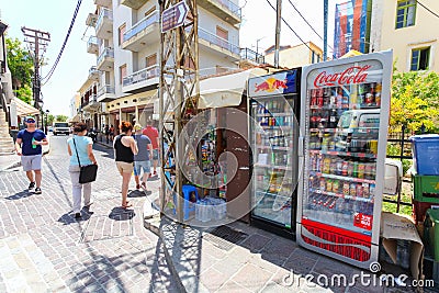 Rethymnon, Island Crete, Greece, - June 23, 2016: The small market stall with street refrigerators with various cold drinks on the Editorial Stock Photo