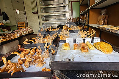Rethymnon, Island Crete, Greece, - June 23, 2016: Traditional Greece bakery with fresh and tasty muffins, pastry and bread on the Editorial Stock Photo