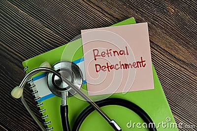 Retinal Detachment write on sticky notes isolated on Wooden Table Stock Photo