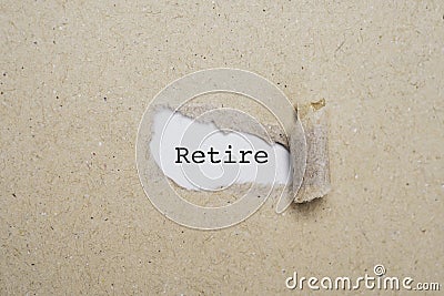Retire wording on brown punch paper for wealth financial planning ,money saving and life insurance of retirement concept Stock Photo