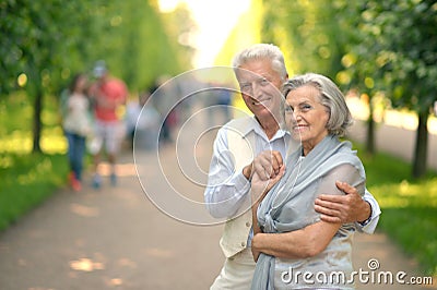 Retired couple in park Stock Photo