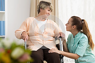 Retired woman having professional care Stock Photo