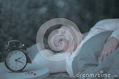 Retired woman having sleep problem Stock Photo