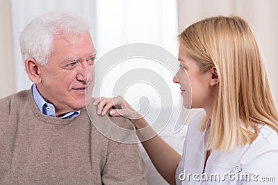 Retiree and senior care assistant Stock Photo