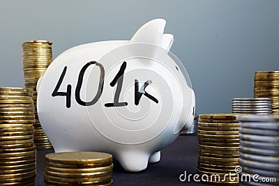 Retirement plan. Piggy bank with word 401k. Stock Photo