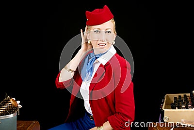 Retro Airline Stewardess Preparing for Work Stock Photo