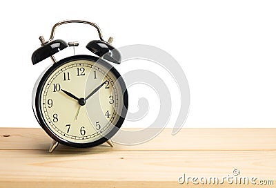 Retro alarm clock on white background Stock Photo
