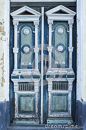 Retro architexture element old aged weathered door Stock Photo