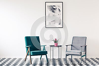 Retro armchairs in minimalist interior Stock Photo