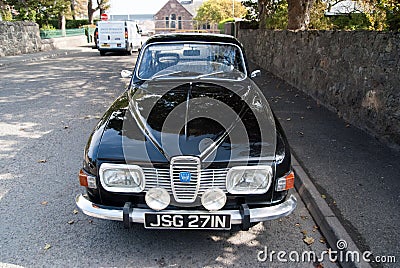 Retro automobile on asphalt road. Saab car parked on street. Transport and transportation. It is the one car I want Editorial Stock Photo