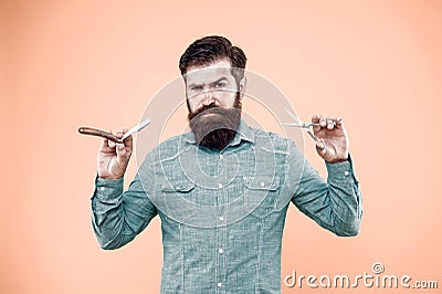 Retro barbershop. Hipster with old tools. Designing haircut. Fresh hairstyle. Barbershop concept. Care for men Stock Photo