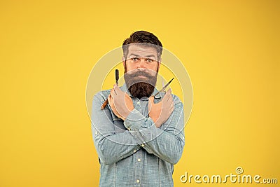 Retro barbershop. Hipster with tools. Designing haircut. Fresh hairstyle. Barbershop concept. Barbershop salon. Personal Stock Photo