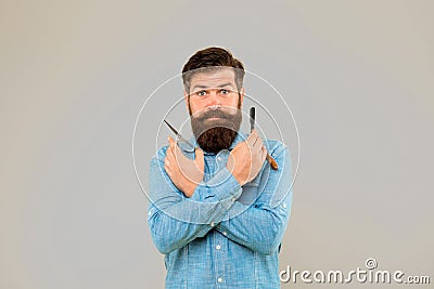 Retro barbershop. Hipster with tools. Designing haircut. Fresh hairstyle. Barbershop concept. Barbershop salon. Personal Stock Photo