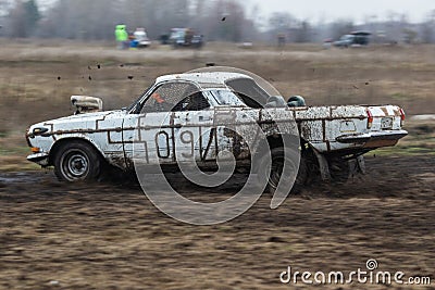 Retro car GAZ 24 Volga on a country road outside the city. Editorial Stock Photo