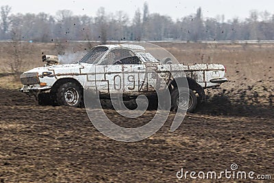Retro car GAZ 24 Volga on a country road outside the city. Editorial Stock Photo