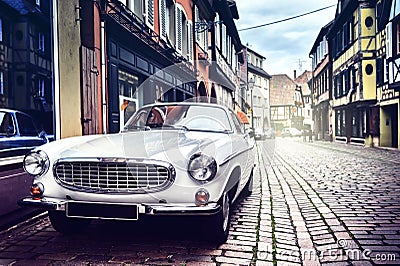 Retro car in old city street Stock Photo