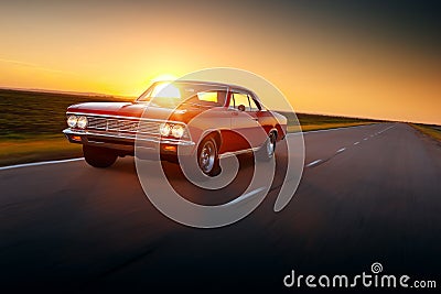 Fast drive retro red car speed on the road 1960s chevrolet cheville malibu Stock Photo