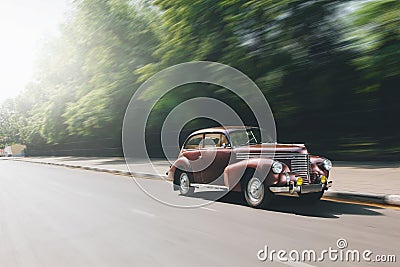 fast drive Retro Car speed on city road opel Stock Photo