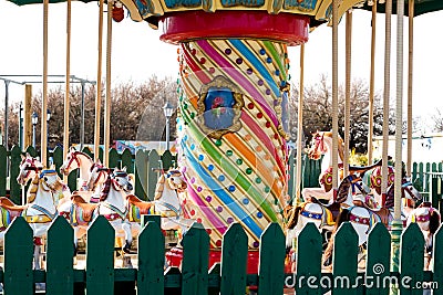 Retro carousel in empty closed fairground Editorial Stock Photo