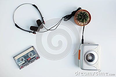 Retro cassette tape and Portable tape player with radio on white floor Stock Photo