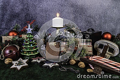 Retro Christmas presents and decorations with candle Stock Photo