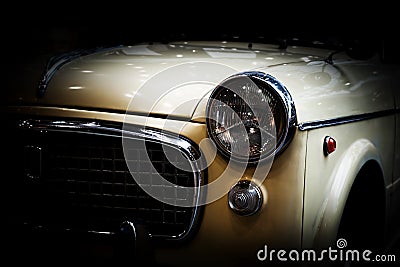 Retro classic car on black background. Vintage, elegant Stock Photo