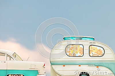 Retro classic car and seventies caravan with flower curtains Stock Photo