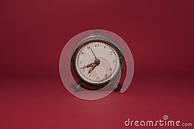 Retro clock time, red backgrounds Stock Photo