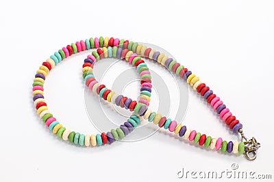 Old Colorful Jewelery Beads Natural Home Made Necklace on White Background Stock Photo