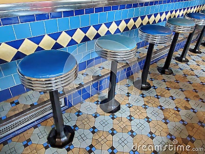 Retro diner with blue barstools Stock Photo