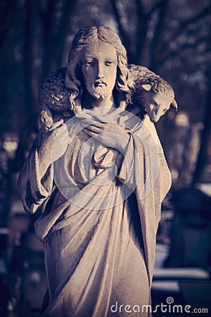 Retro and dirty styled image of antique statue Jesus Christ Goo Stock Photo