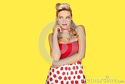 Retro fashion model in red polka dots Stock Photo