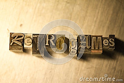 Retro games - Horizontal metal letterpress lettering sign Stock Photo