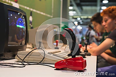 Retro joystick at Games Week 2014 in Milan, Italy Editorial Stock Photo