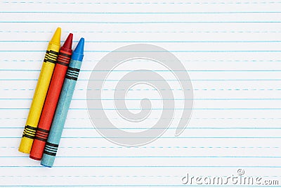 Retro lined paper with a three crayons Stock Photo